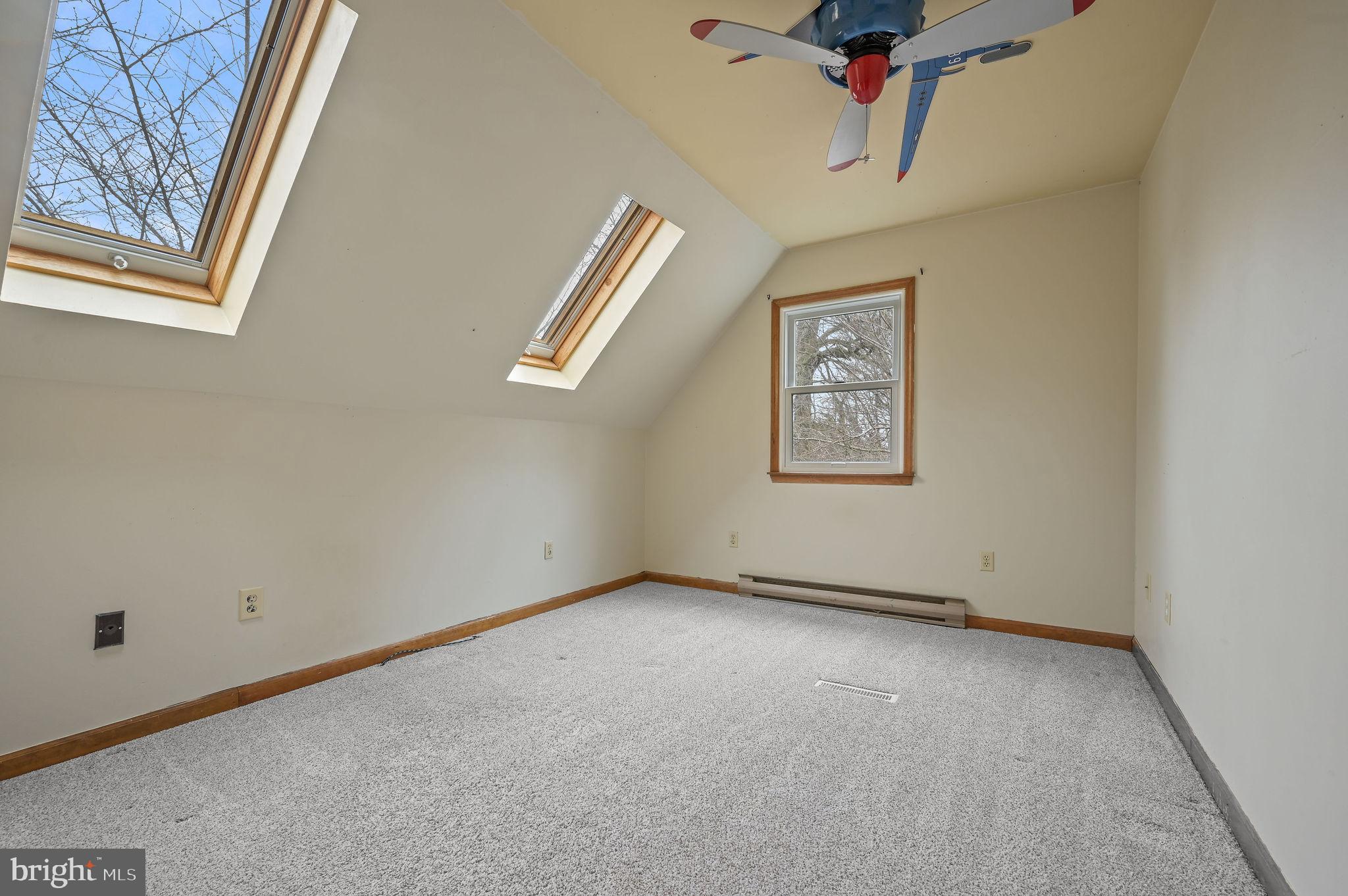 334 Sophers Row Magnolia, DE 19962 - Photo 38 of 47 an empty room with windows and cabinet
