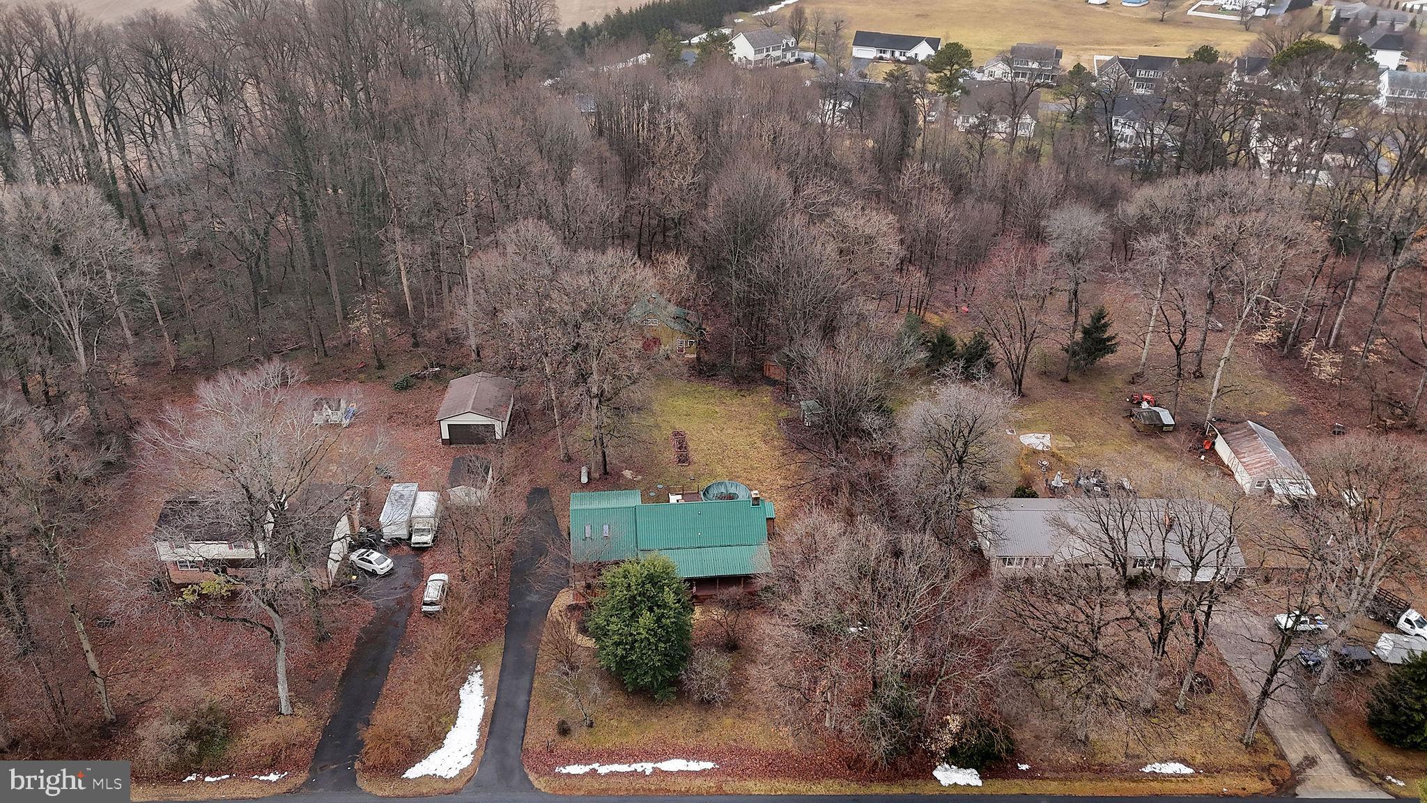 334 Sophers Row Magnolia, DE 19962 - Photo 46 of 47 an aerial view of a residential houses with outdoor space