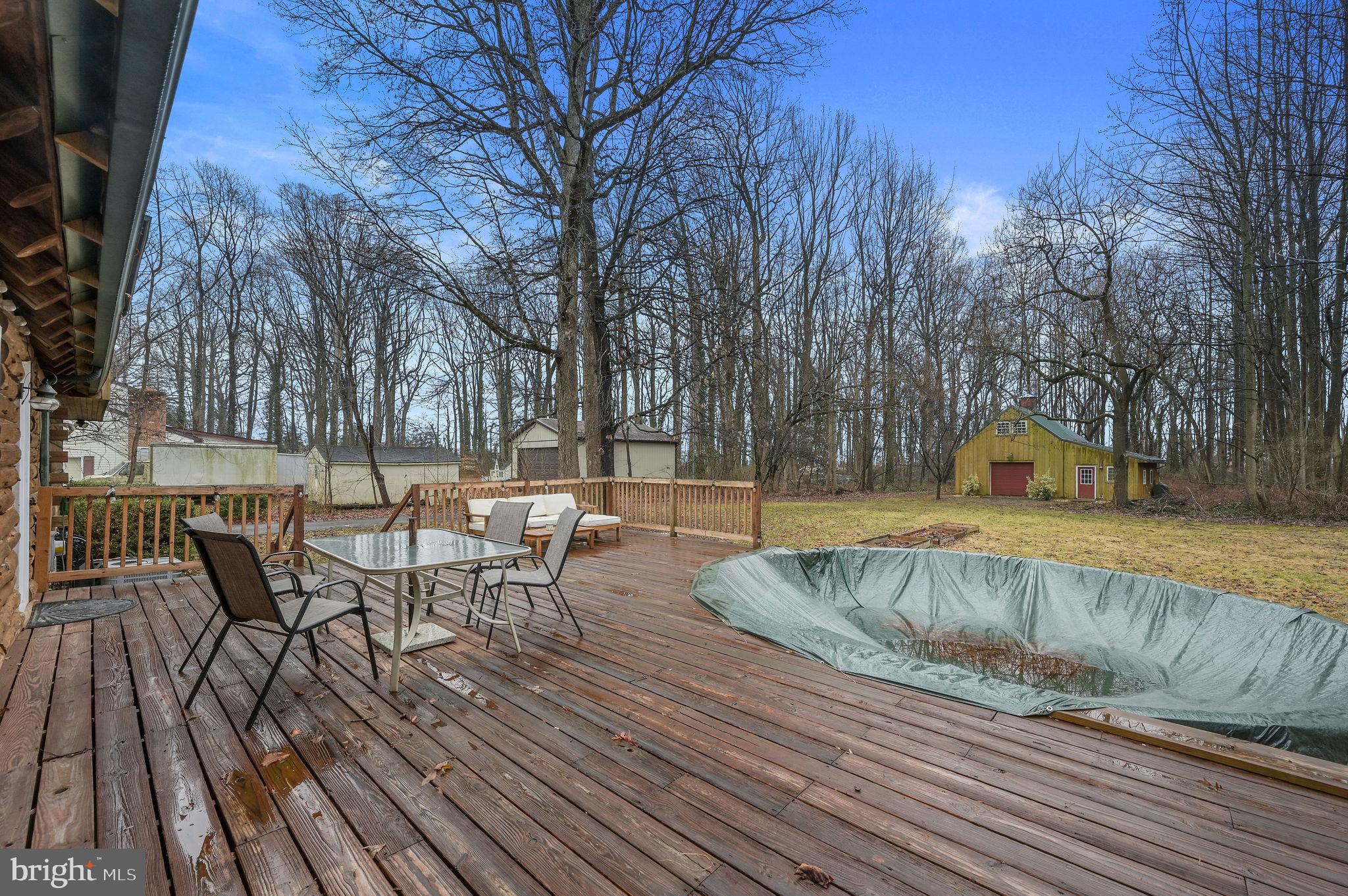 334 Sophers Row Magnolia, DE 19962 - Photo 9 of 47 a view of a swimming pool with a patio