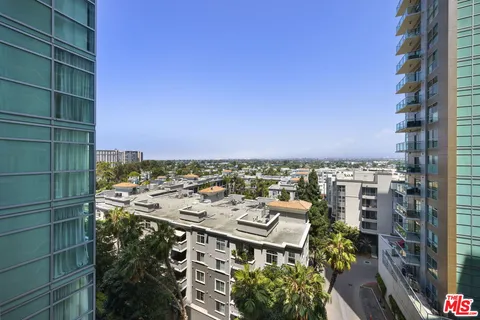 a view of a city with tall buildings