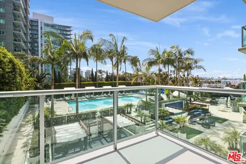 a view of living room with furniture and fireplace