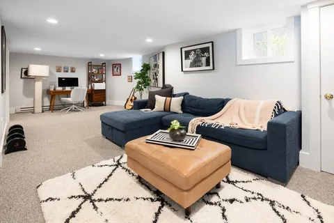 a living room with furniture and a couch