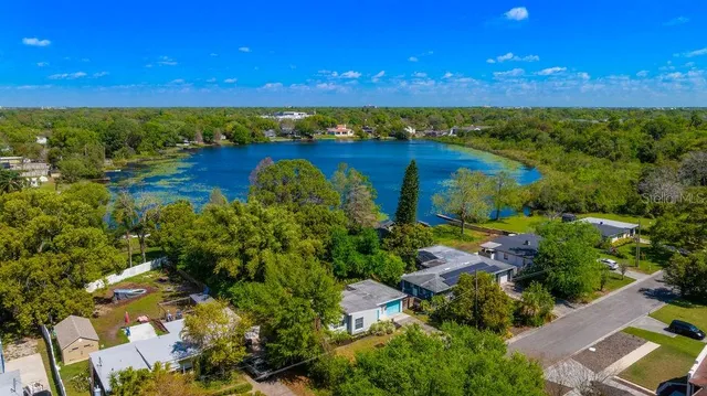a view of a lake and a yard