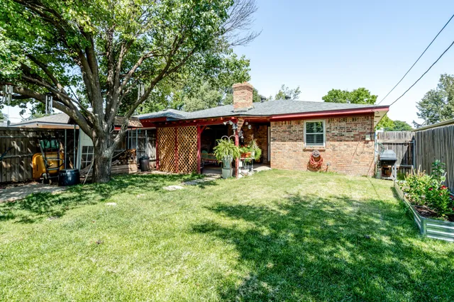 a house view with a garden space