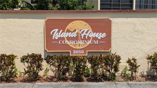a sign that is on the side of a building