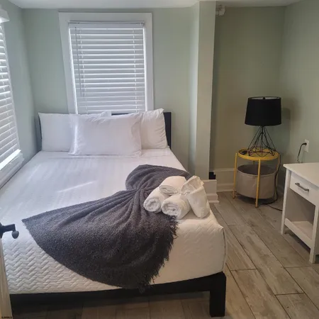 a view of a living room and a wooden floor