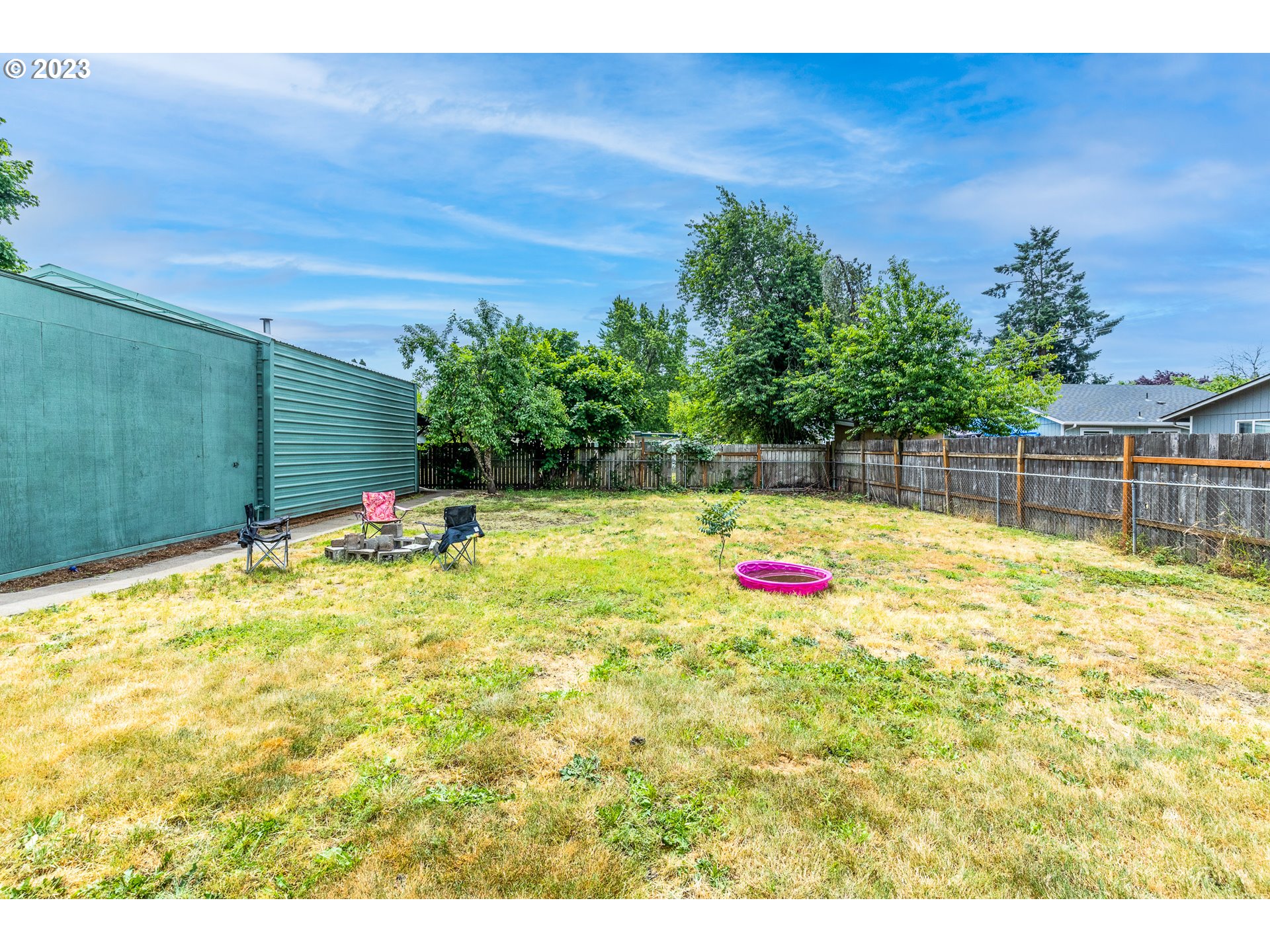 5119 E Street Springfield, OR 97478 - Photo 23 of 28 a view of swimming pool with a yard