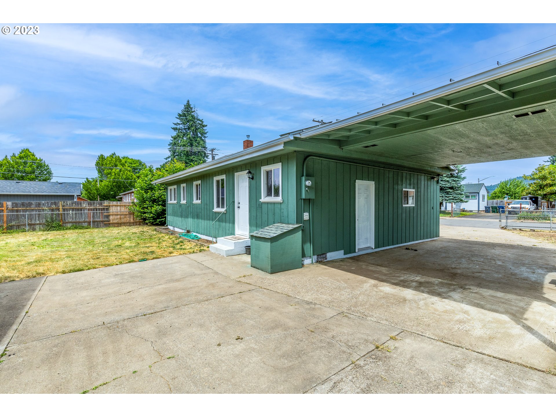 5119 E Street Springfield, OR 97478 - Photo 28 of 28 a view of an house with backyard and swimming pool