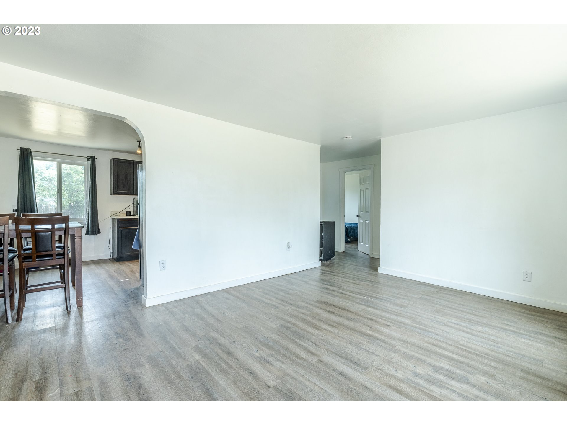 5119 E Street Springfield, OR 97478 - Photo 6 of 28 a view of an empty room and wooden floor