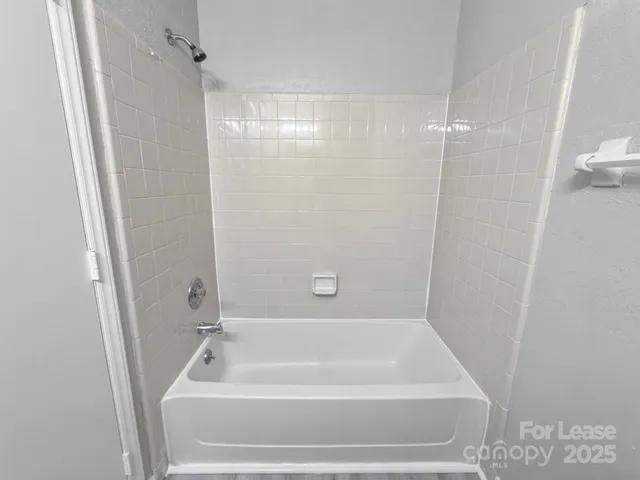 a bathroom with a sink toilet a mirror and vanity