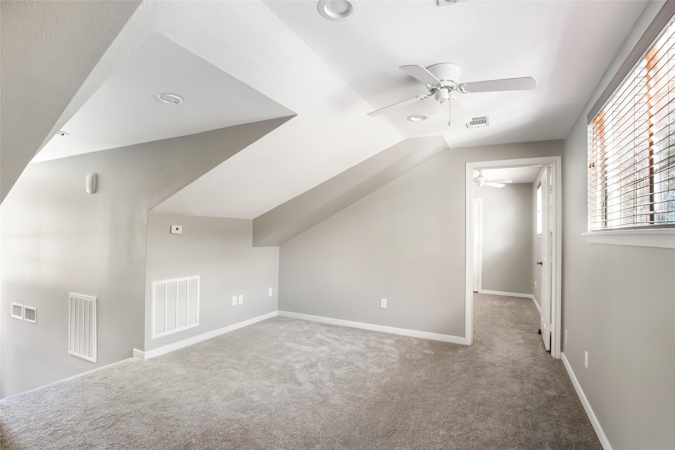 1300 Smith Road Huffman, TX 77336 - Photo 40 of 50 Versatile upstairs space ideal for a game room or cozy living area.