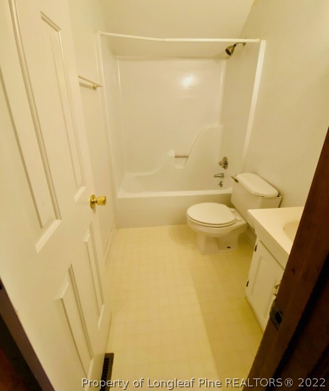 90 Cypress Road Cameron, NC 28326 - Photo 13 of 22 a bathroom with a sink a toilet and shower