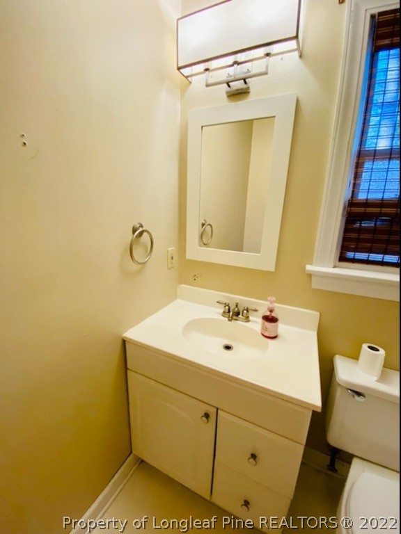 90 Cypress Road Cameron, NC 28326 - Photo 17 of 22 a bathroom with a sink and a mirror