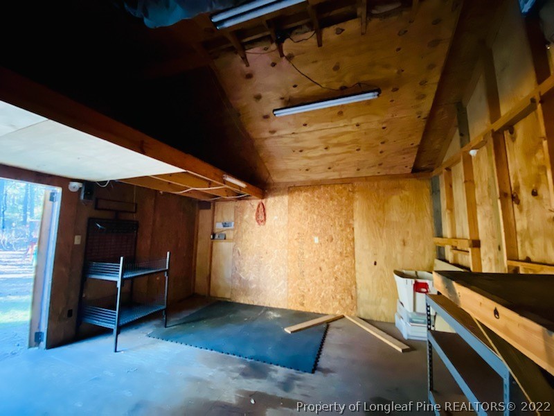 90 Cypress Road Cameron, NC 28326 - Photo 22 of 22 a room with wooden furniture and windows