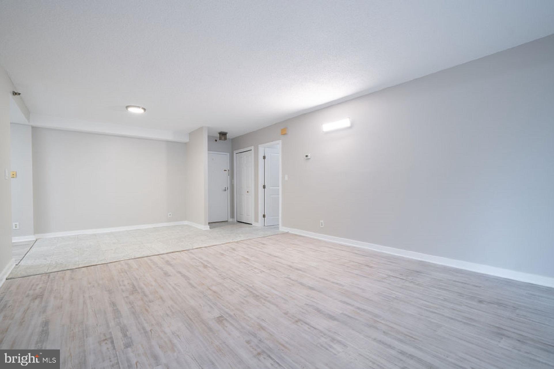 5505 Seminary Road, Unit 103N Falls Church, VA 22041 - Photo 4 of 59 a view of an empty room with wooden floor