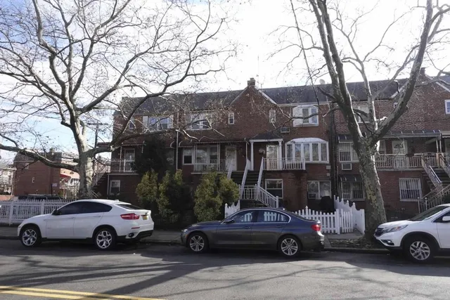 a car parked in front of a building