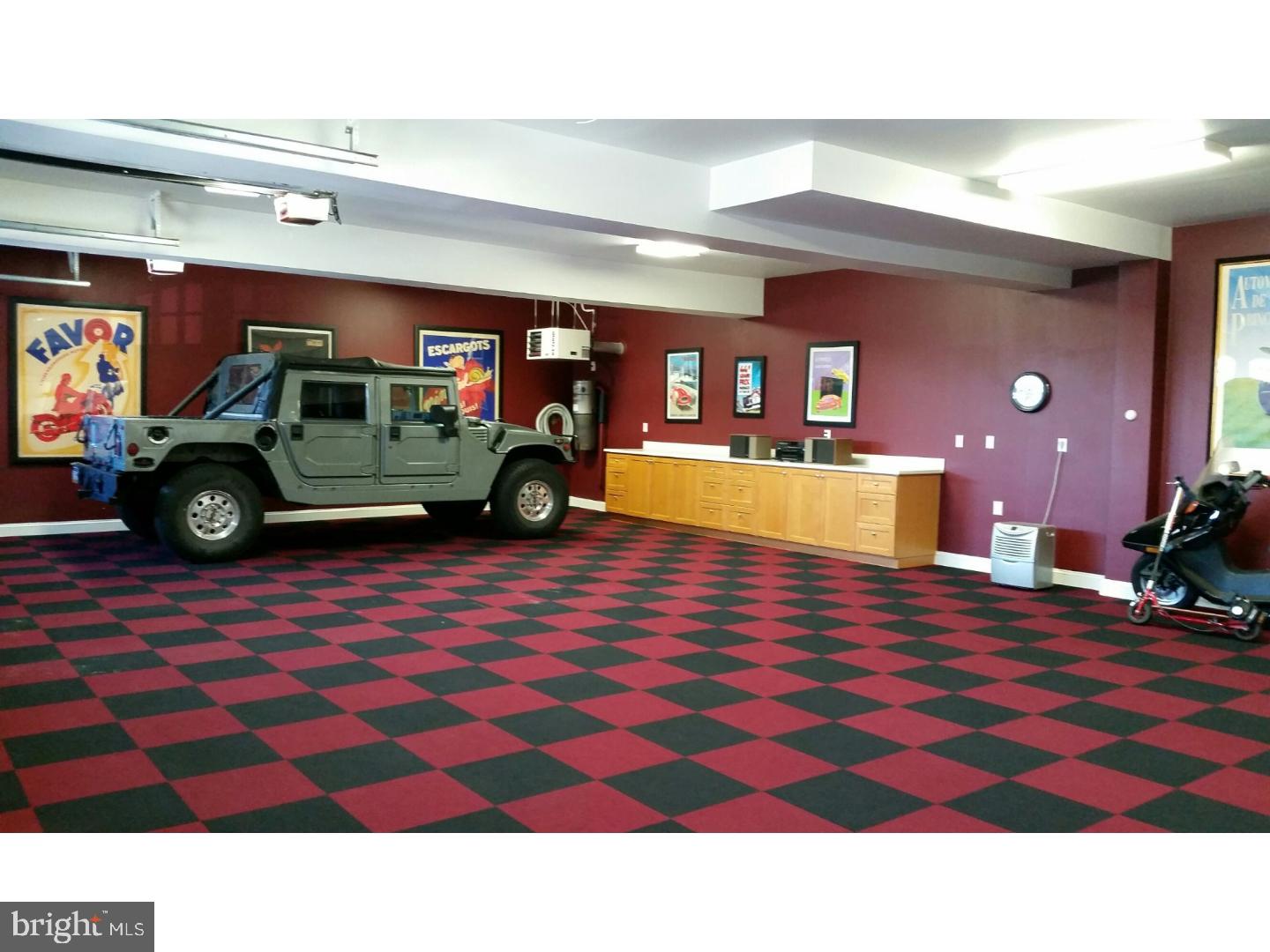 1653 Mt Pleasant Road Villanova, PA 19085 - Photo 13 of 16 a bathroom with a sink a mirror and shower