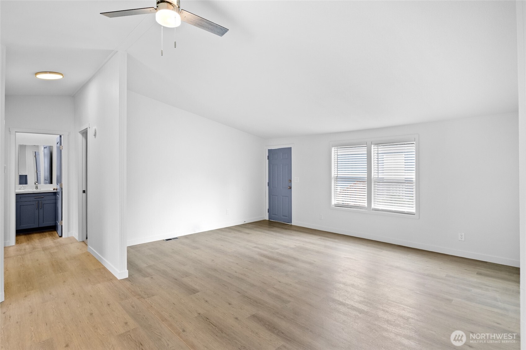 10324 Delphi Road Southwest, Unit 14 Olympia, WA 98512 - Photo 13 of 25 an empty room with windows and fan