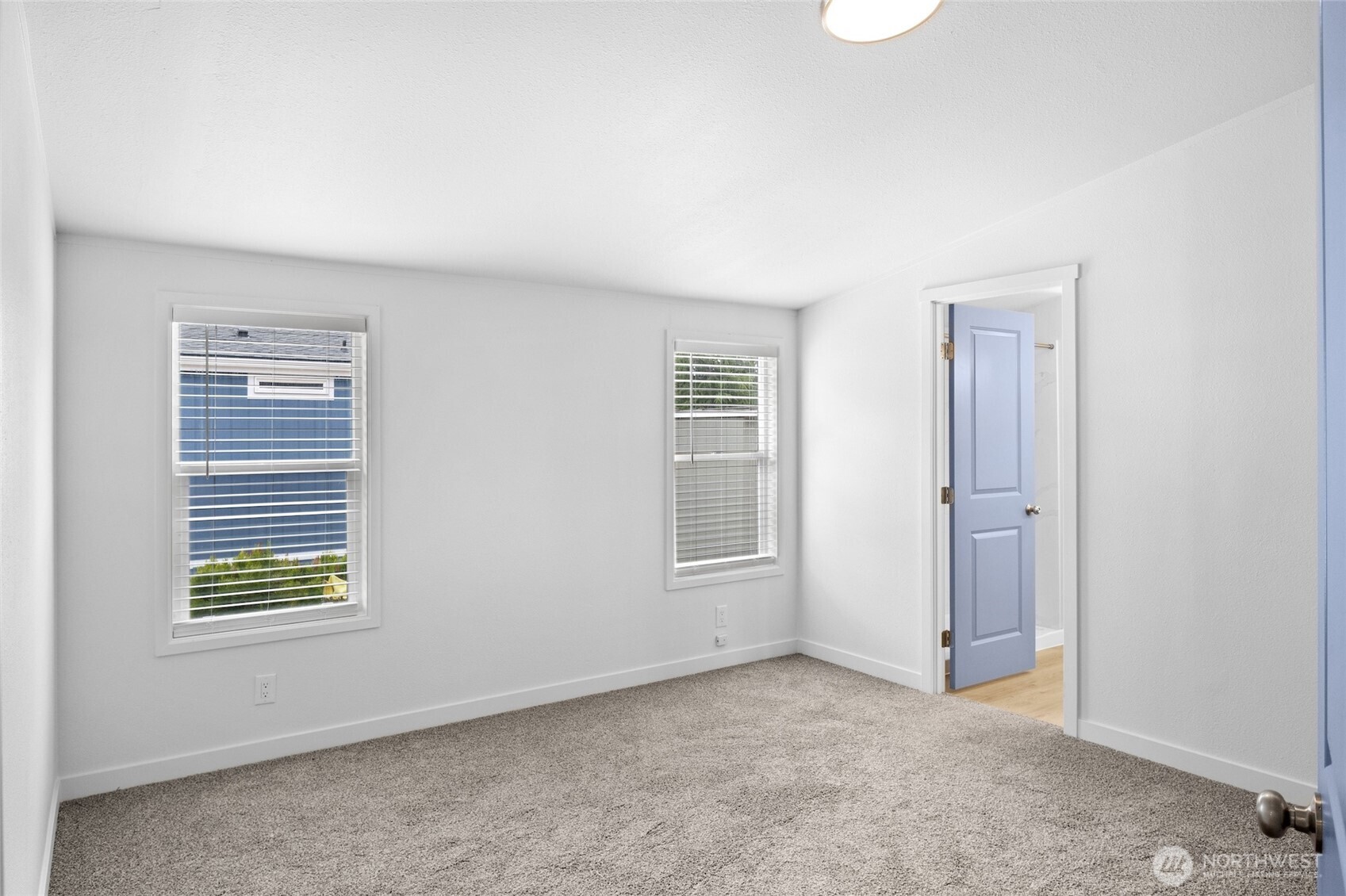 10324 Delphi Road Southwest, Unit 14 Olympia, WA 98512 - Photo 18 of 25 an empty room with windows