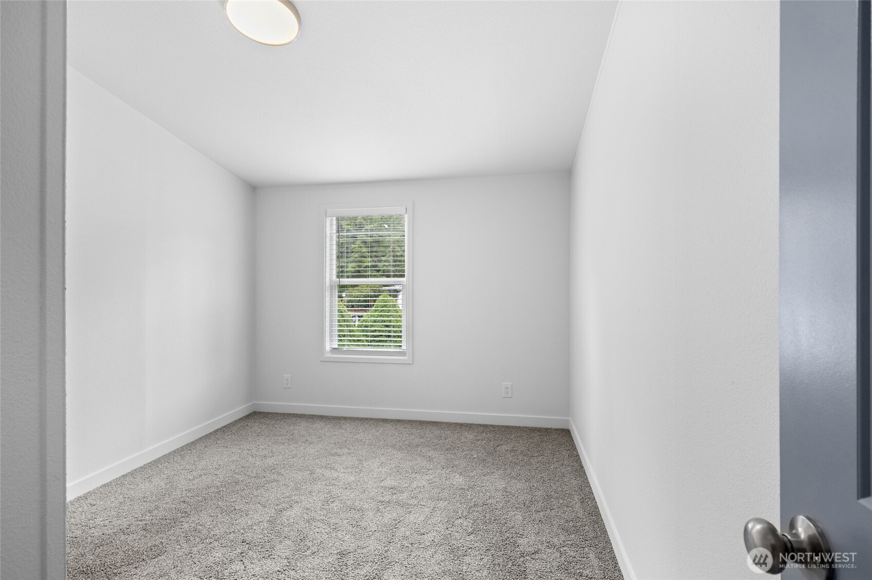 10324 Delphi Road Southwest, Unit 14 Olympia, WA 98512 - Photo 19 of 25 an empty room with a window