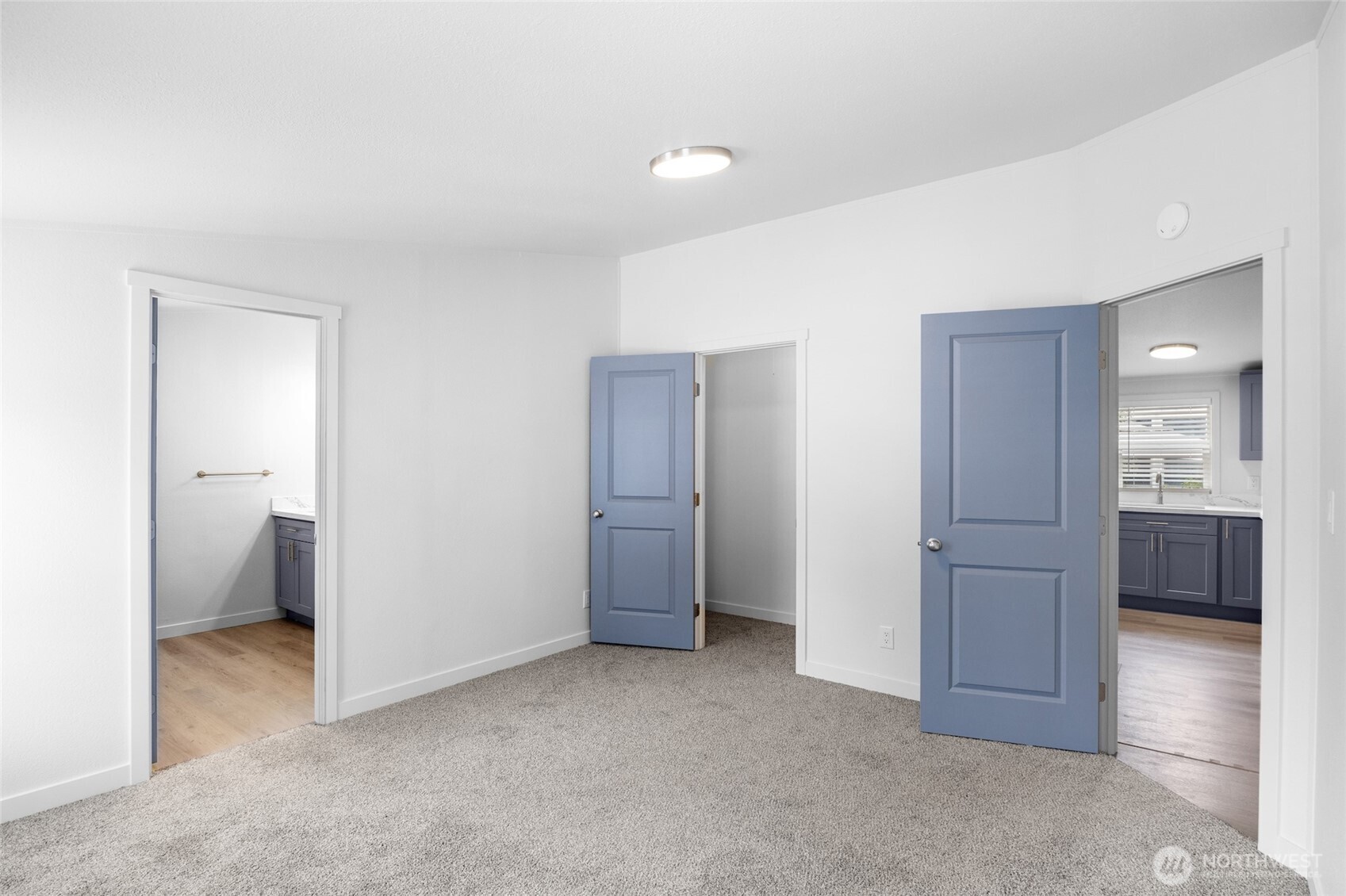 10324 Delphi Road Southwest, Unit 14 Olympia, WA 98512 - Photo 22 of 25 a view of a walk in closet and bedroom space