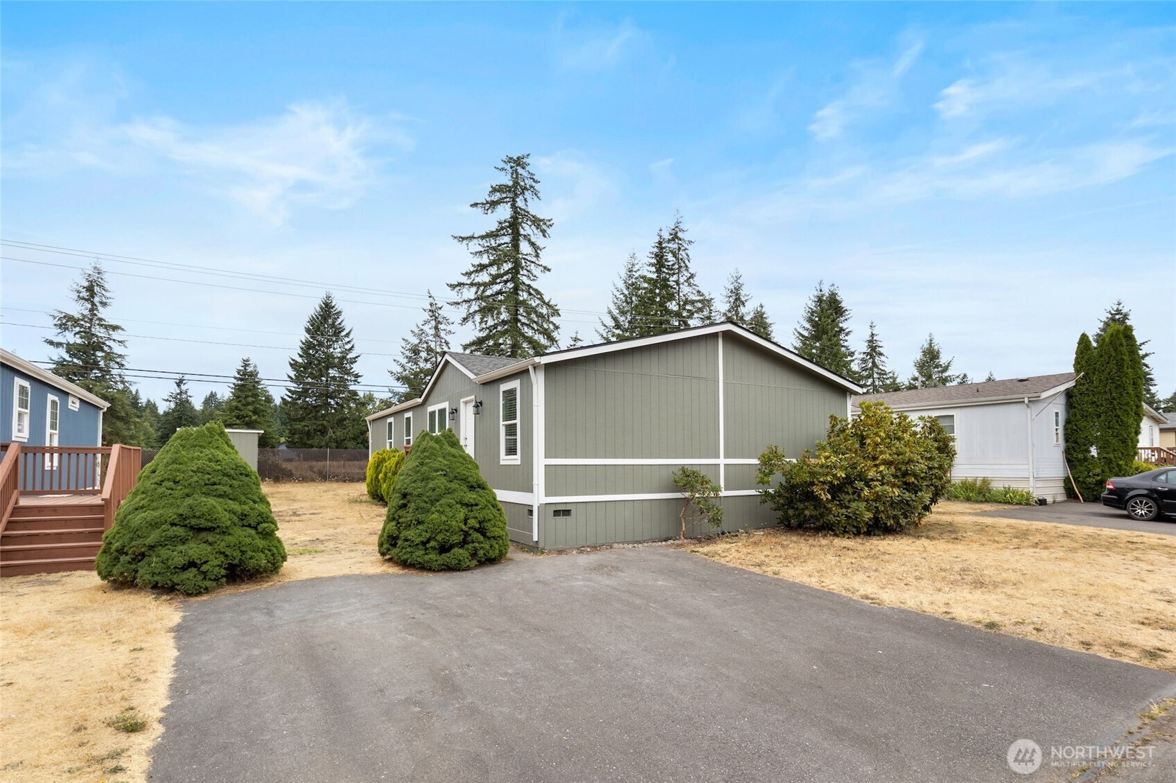 10324 Delphi Road Southwest, Unit 14 Olympia, WA 98512 - Photo 25 of 25 a front view of a house with a yard