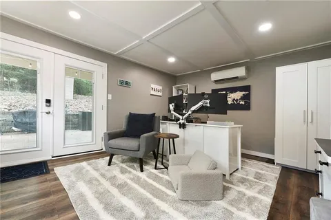 a work room with a couch and a table
