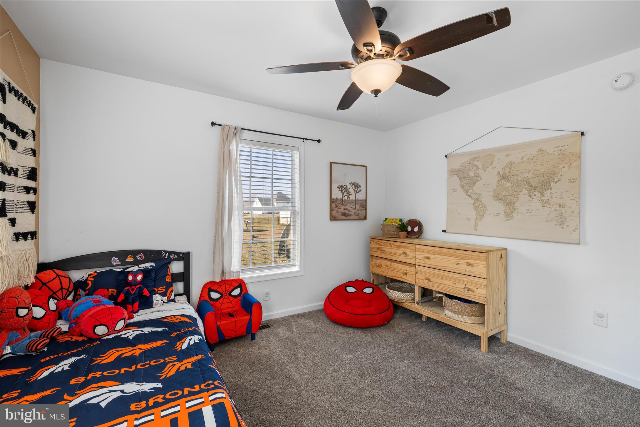 36831 Red Berry Road Delmar, DE 19940 - Photo 24 of 46 a bedroom with furniture window and ceiling fan