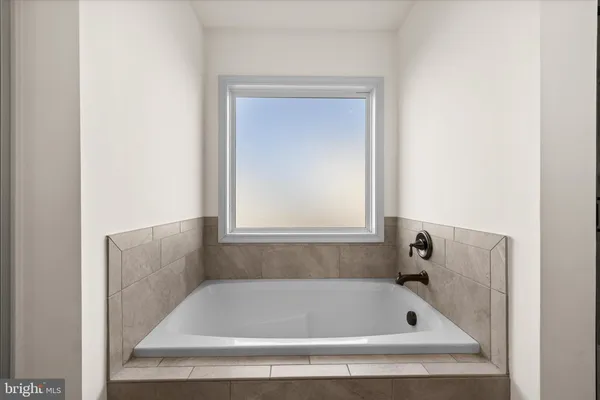 a view of balcony with furniture