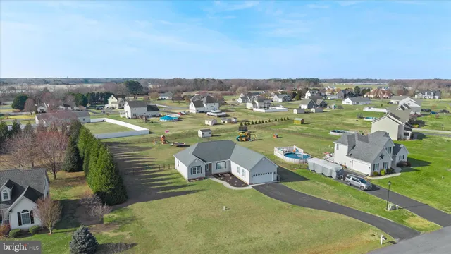 swimming pool view with a lake view