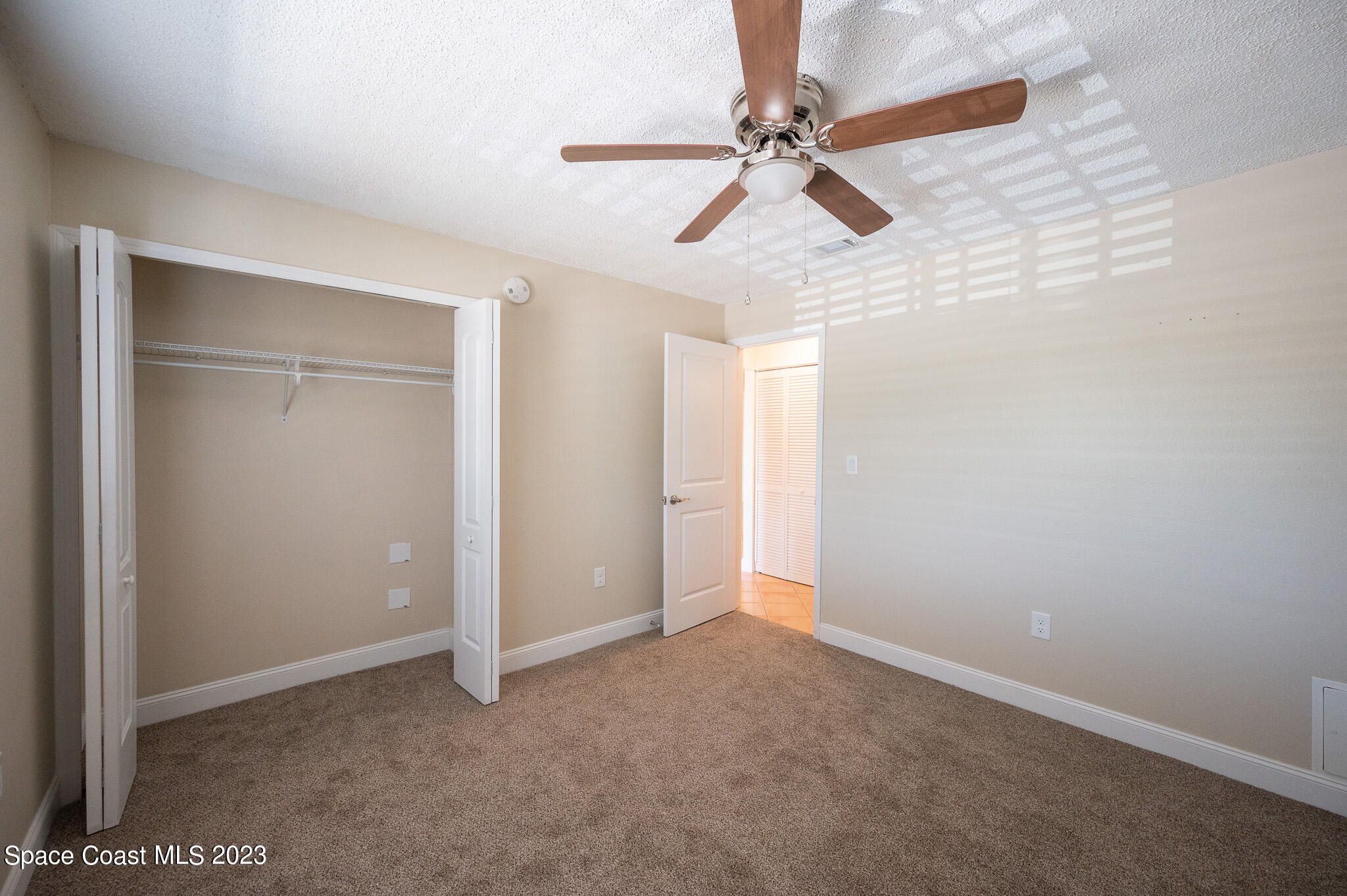 100 Canebreakers Drive, Unit 206 Cocoa, FL 32927 - Photo 14 of 36 a view of a room with a ceiling fan