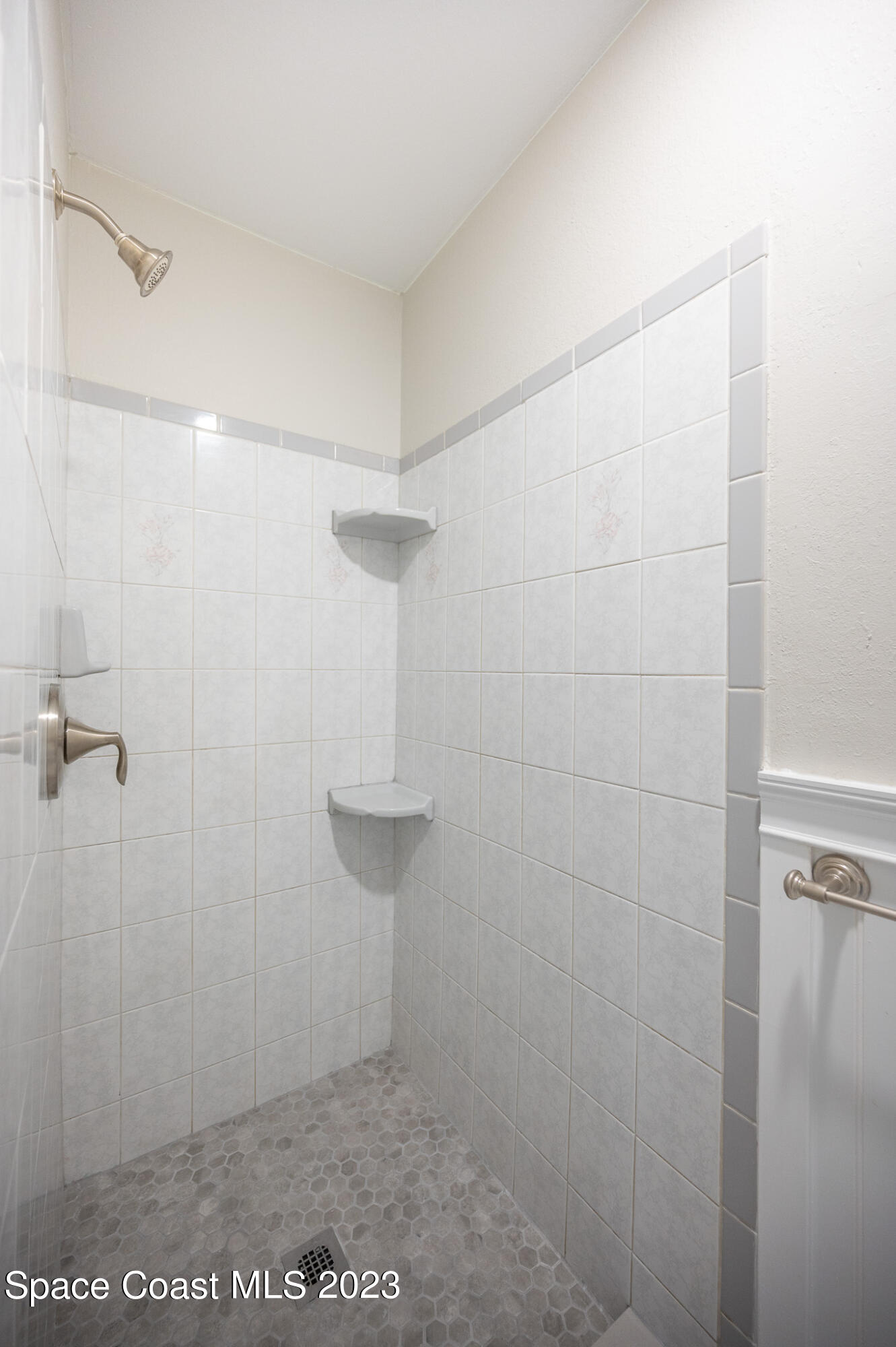 100 Canebreakers Drive, Unit 206 Cocoa, FL 32927 - Photo 17 of 36 a bathroom with a shower