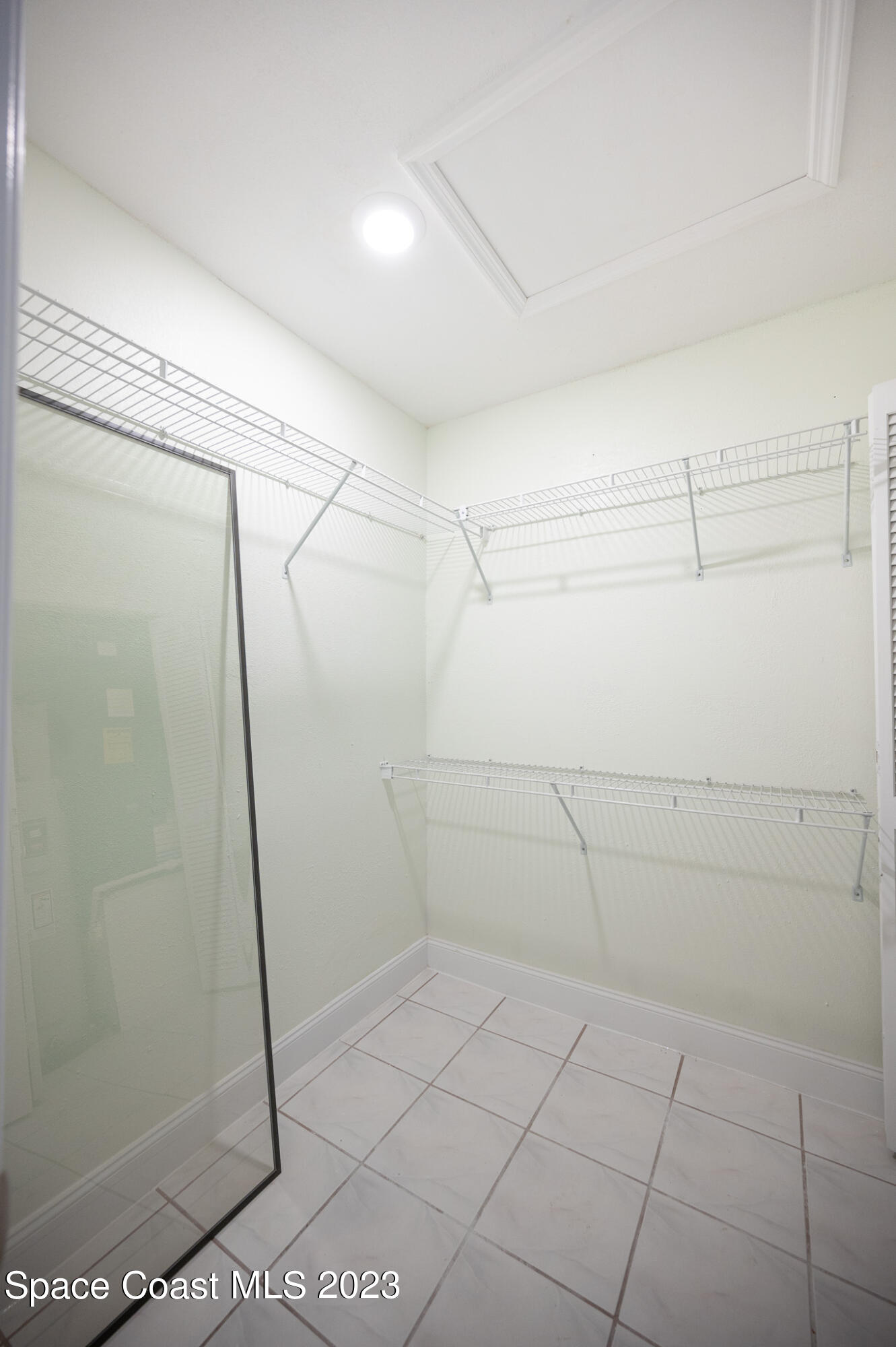 100 Canebreakers Drive, Unit 206 Cocoa, FL 32927 - Photo 19 of 36 a bathroom with a shower