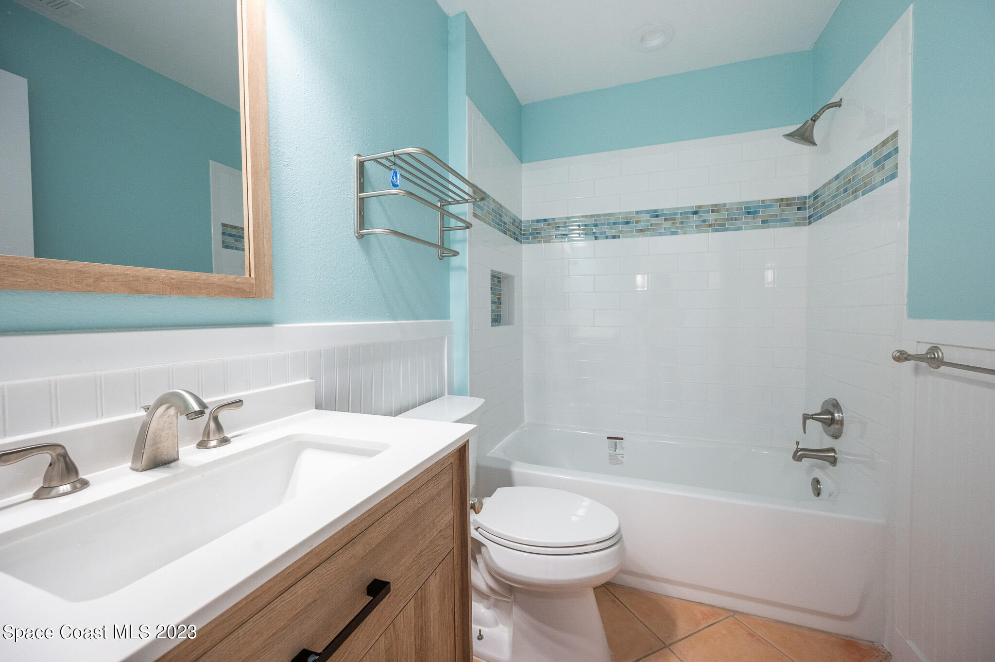 100 Canebreakers Drive, Unit 206 Cocoa, FL 32927 - Photo 22 of 36 a bathroom with a sink toilet and shower