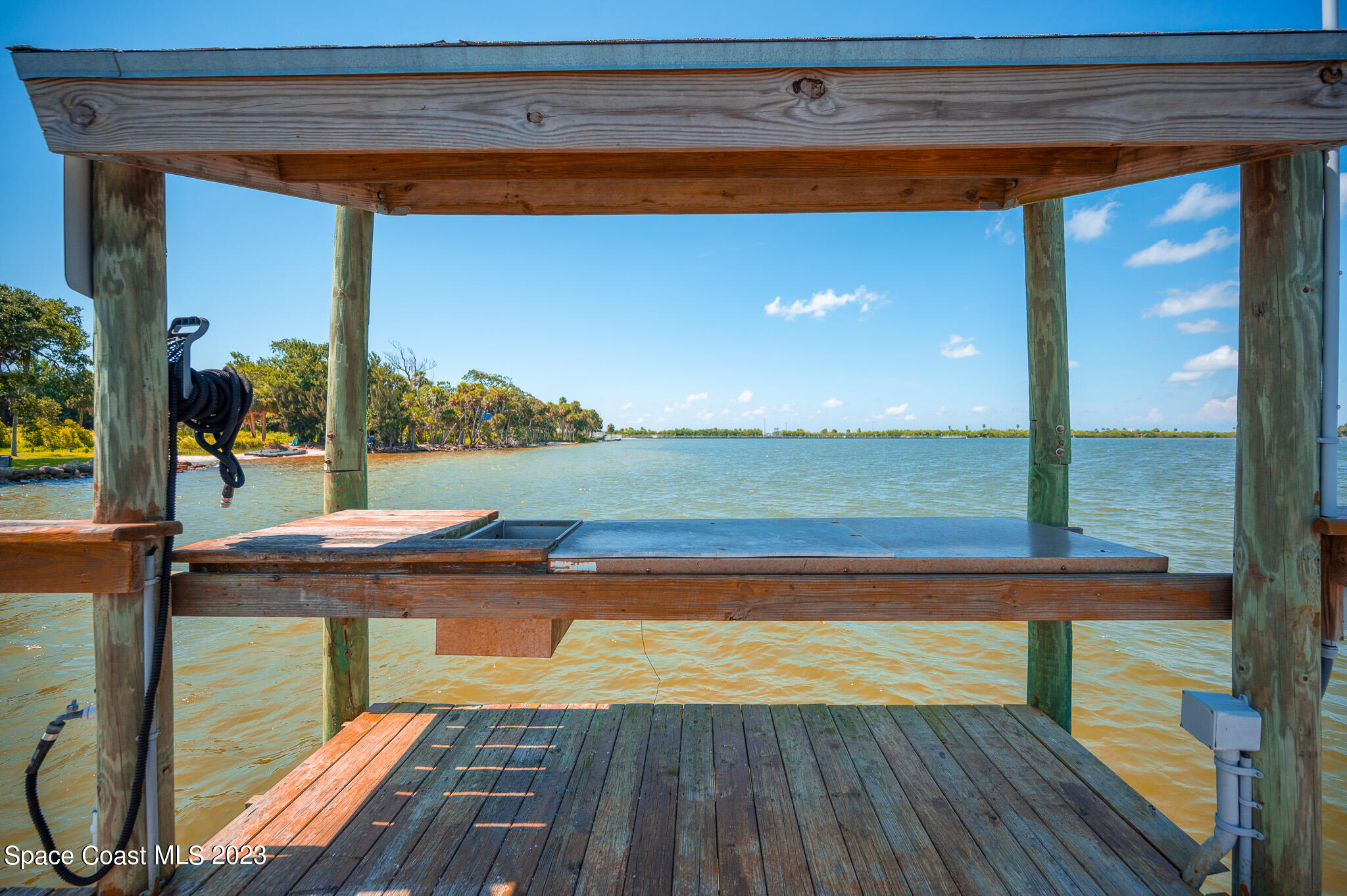 100 Canebreakers Drive, Unit 206 Cocoa, FL 32927 - Photo 31 of 36 a view of swimming pool with outdoor seating
