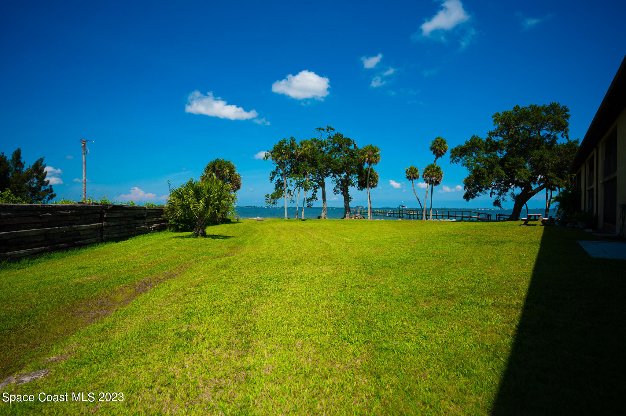 100 Canebreakers Drive, Unit 206 Cocoa, FL 32927 - Photo 34 of 36 a view of yard with swimming pool and green space