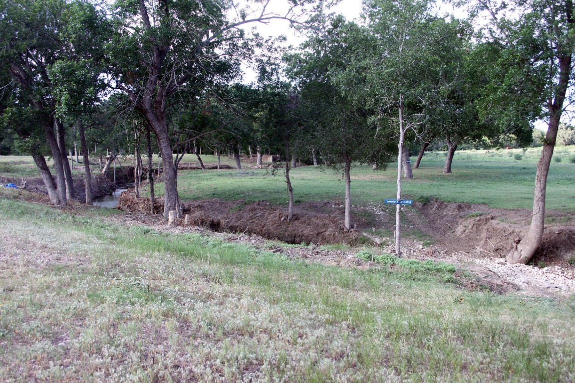 900 Old Lytton Springs Road Lockhart, TX 78644 - Photo 18 of 34 a view of a house with a backyard