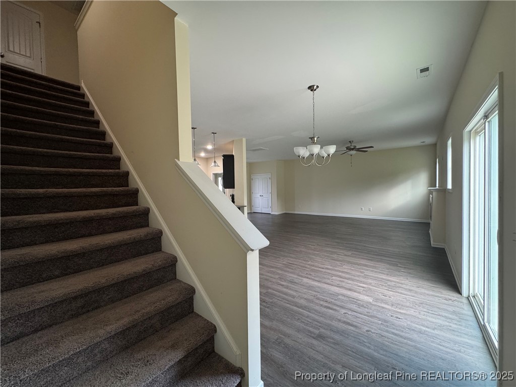185 Ledgebrook Lane Raeford, NC 28376 - Photo 16 of 32 a view of entryway and hall with wooden floor