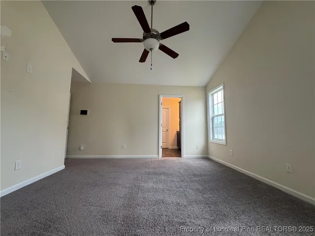 a view of a backyard of the house