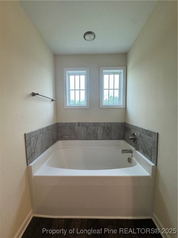 185 Ledgebrook Lane Raeford, NC 28376 - Photo 29 of 32 a bathroom with a bathtub