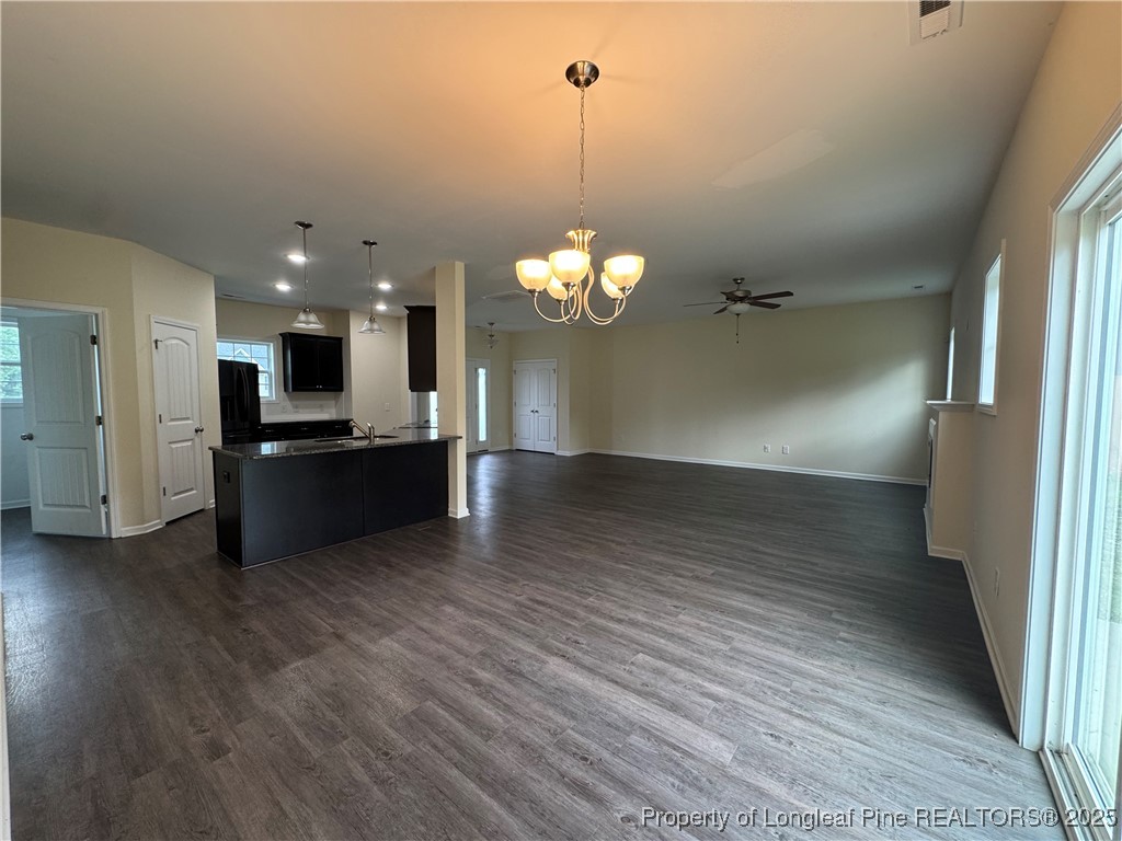 185 Ledgebrook Lane Raeford, NC 28376 - Photo 8 of 32 a view of a kitchen with a sink and an oven