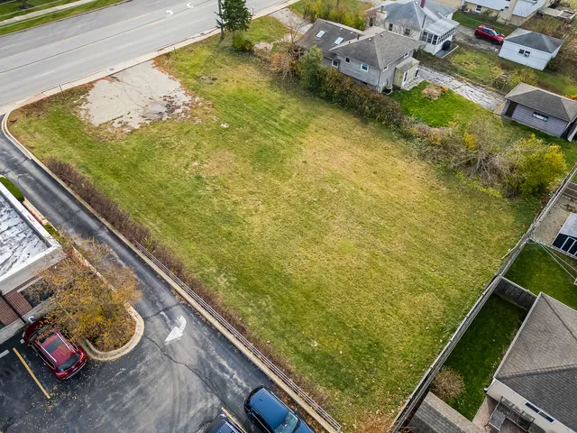 a view of a balcony with chairs