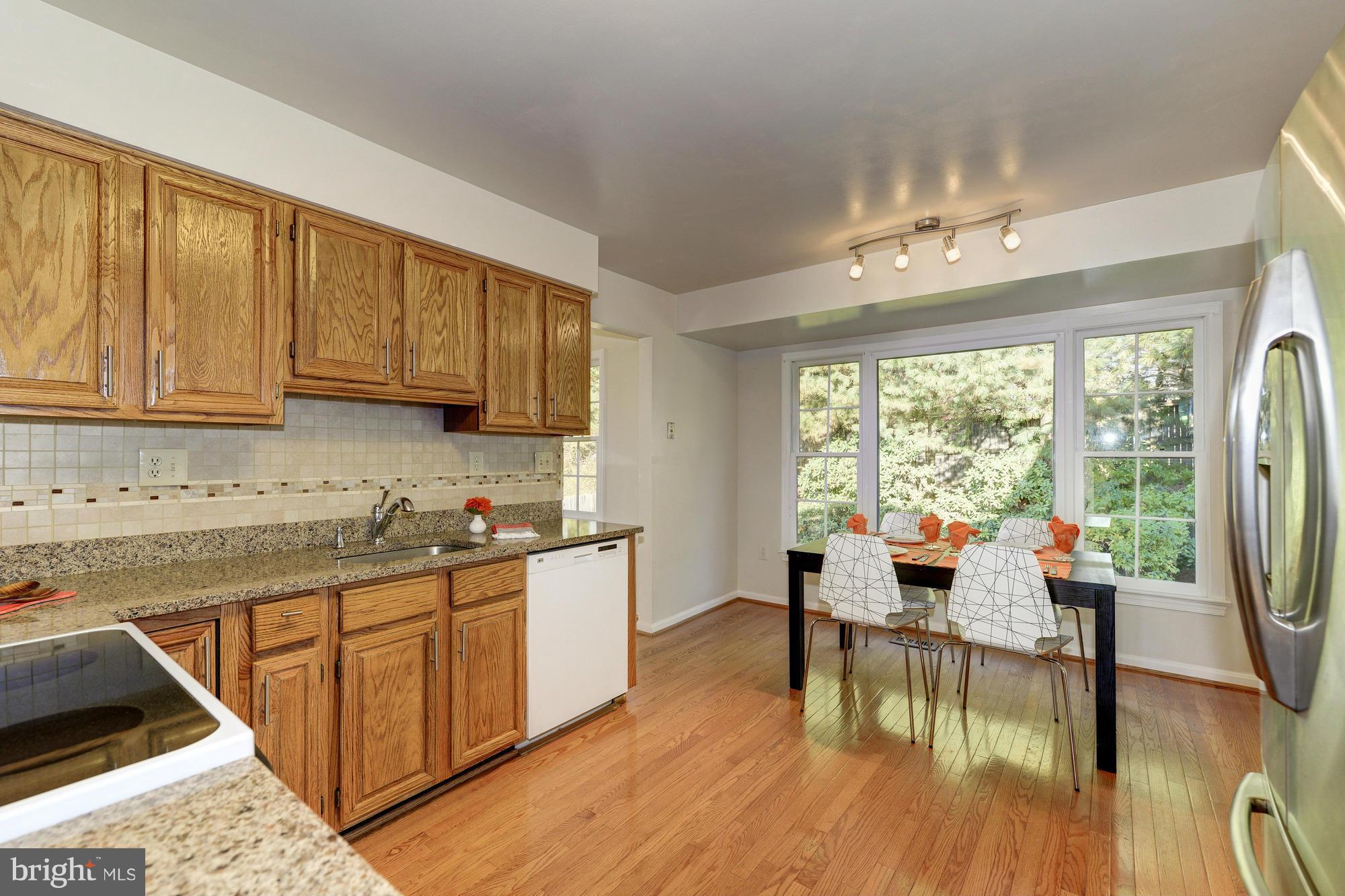 8700 Shadowlake Way Springfield, VA 22153 - Photo 11 of 30 Kitchen with Silestone Countertops