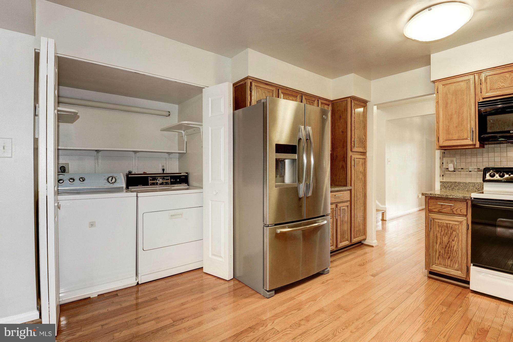 8700 Shadowlake Way Springfield, VA 22153 - Photo 13 of 30 Kitchen with SS Refrigerator