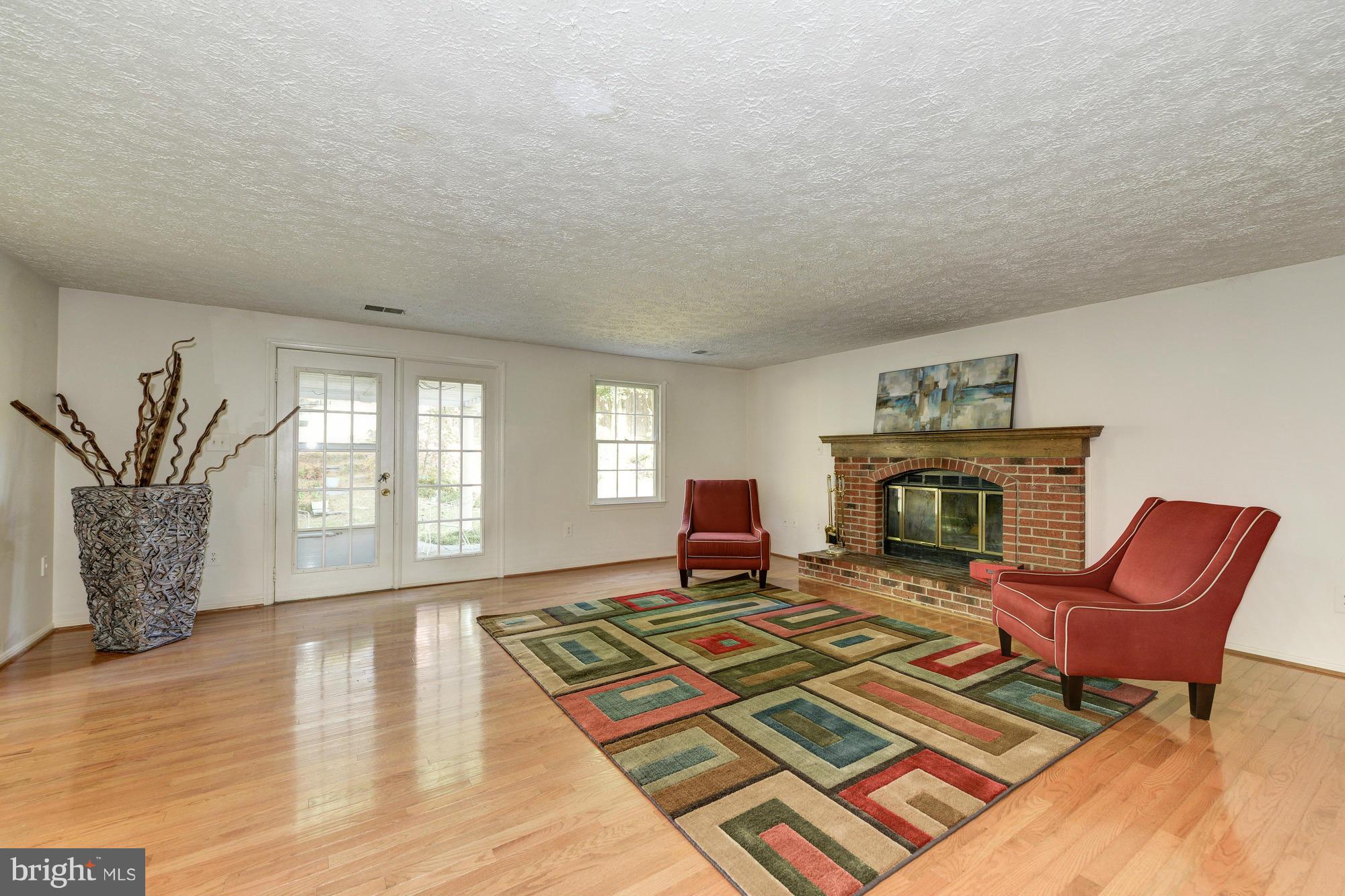 8700 Shadowlake Way Springfield, VA 22153 - Photo 23 of 30 Large Family Room with Fireplace