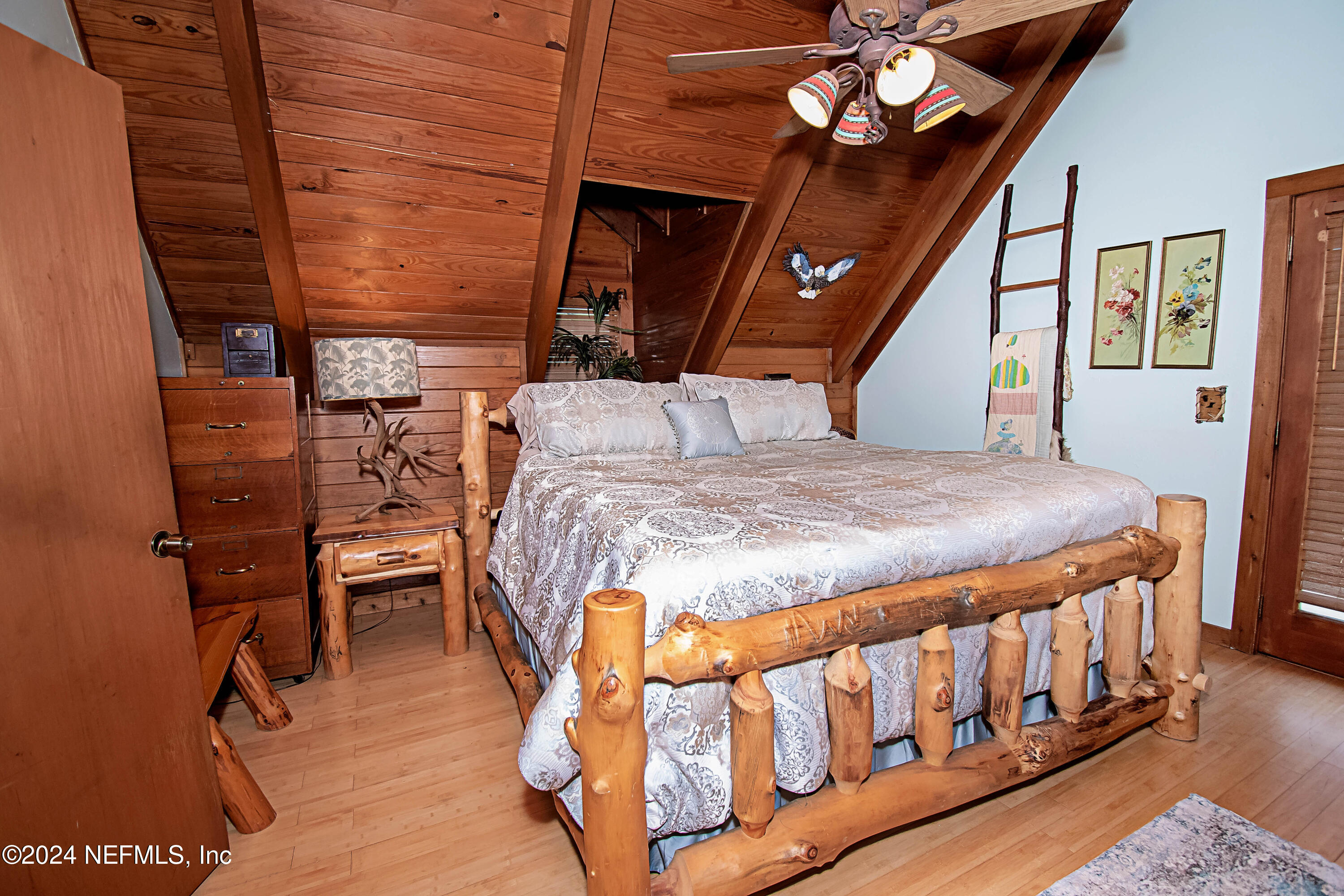 149 Rhoden Drive Macclenny, FL 32063 - Photo 29 of 63 a bed sitting in a bedroom next to a window