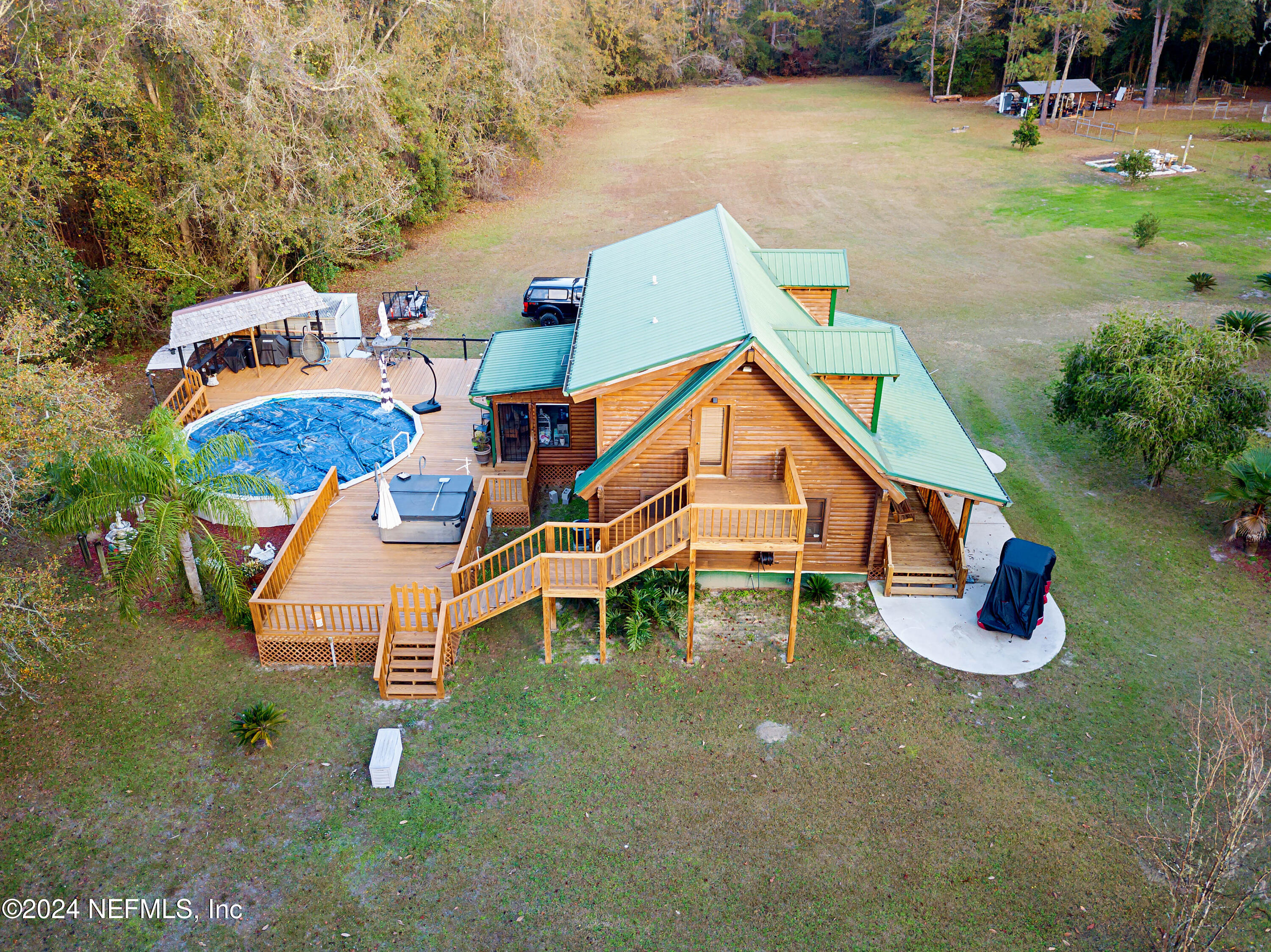149 Rhoden Drive Macclenny, FL 32063 - Photo 3 of 63 an aerial view of a house with outdoor space