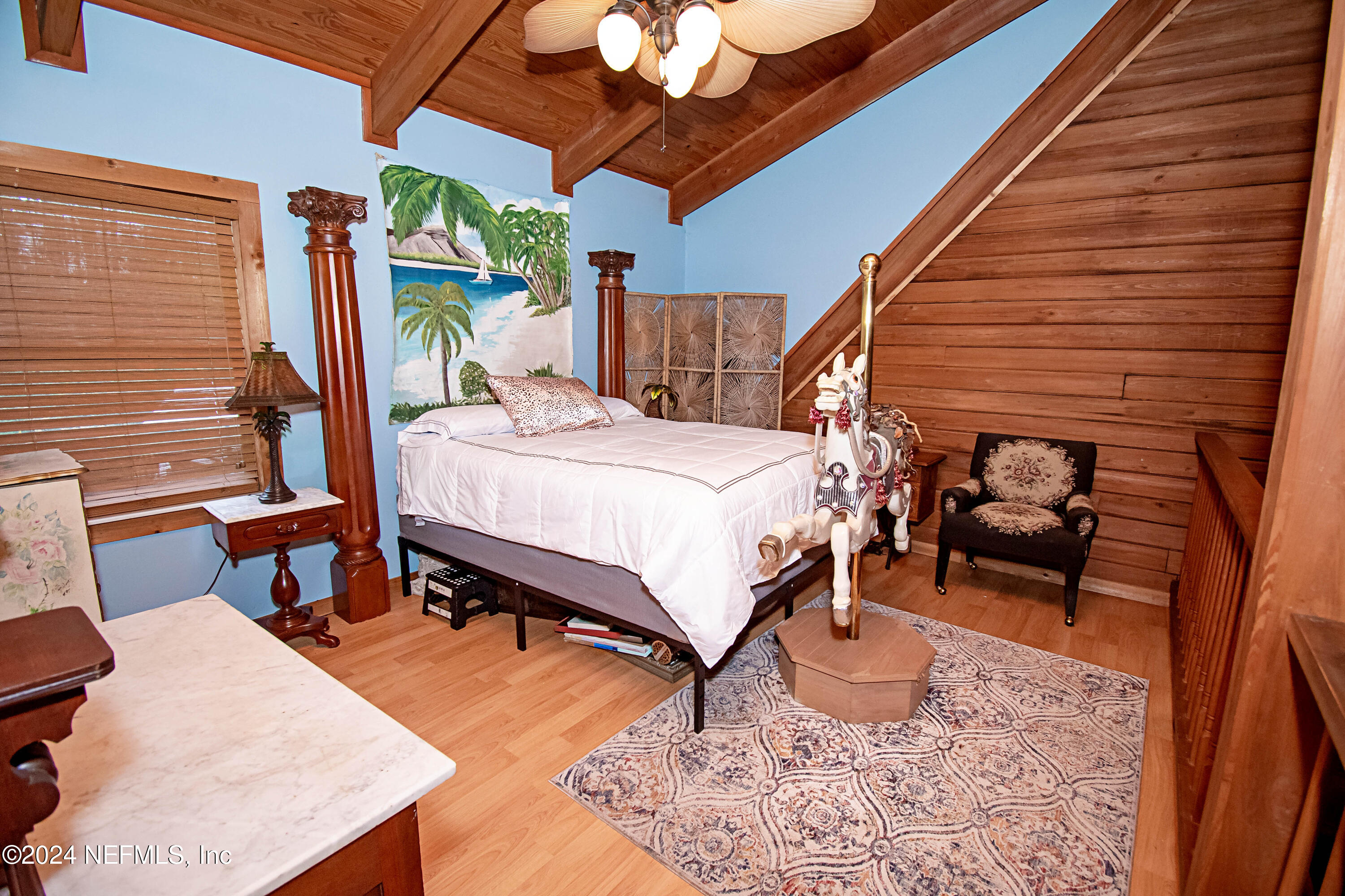 149 Rhoden Drive Macclenny, FL 32063 - Photo 34 of 63 a bed room with a bed and a chair