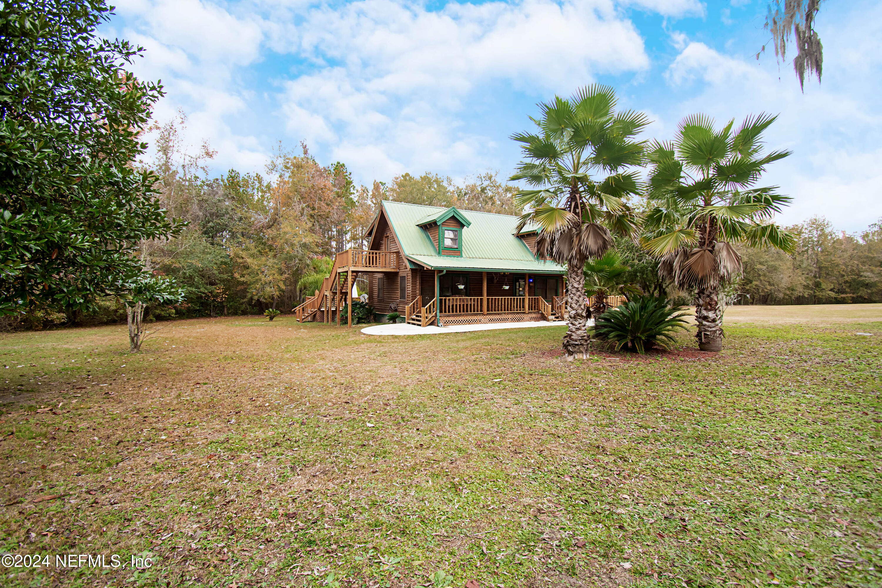 149 Rhoden Drive Macclenny, FL 32063 - Photo 53 of 63 a front view of house with yard and trees