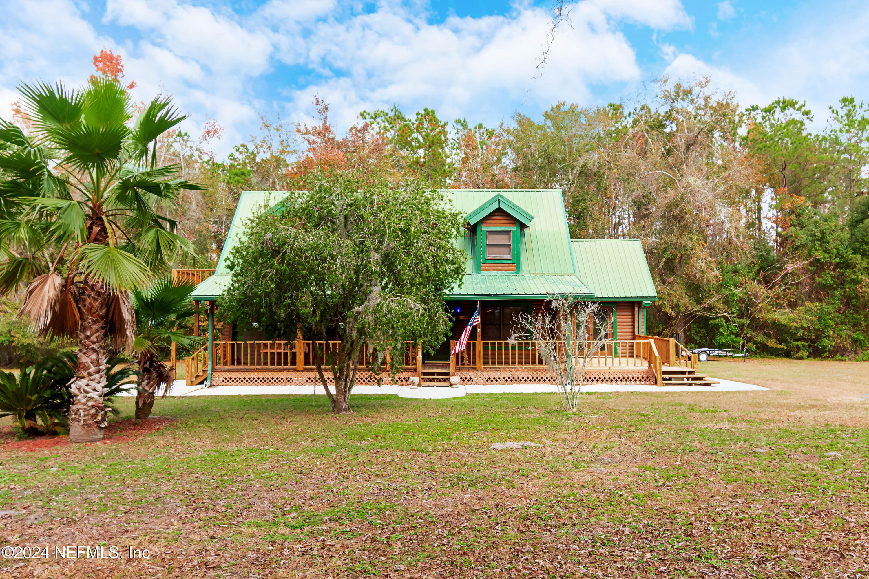 149 Rhoden Drive Macclenny, FL 32063 - Photo 55 of 63 a front view of a house with a yard